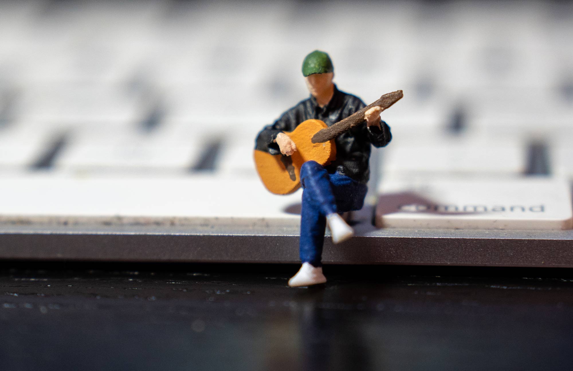 Guitar player figurine